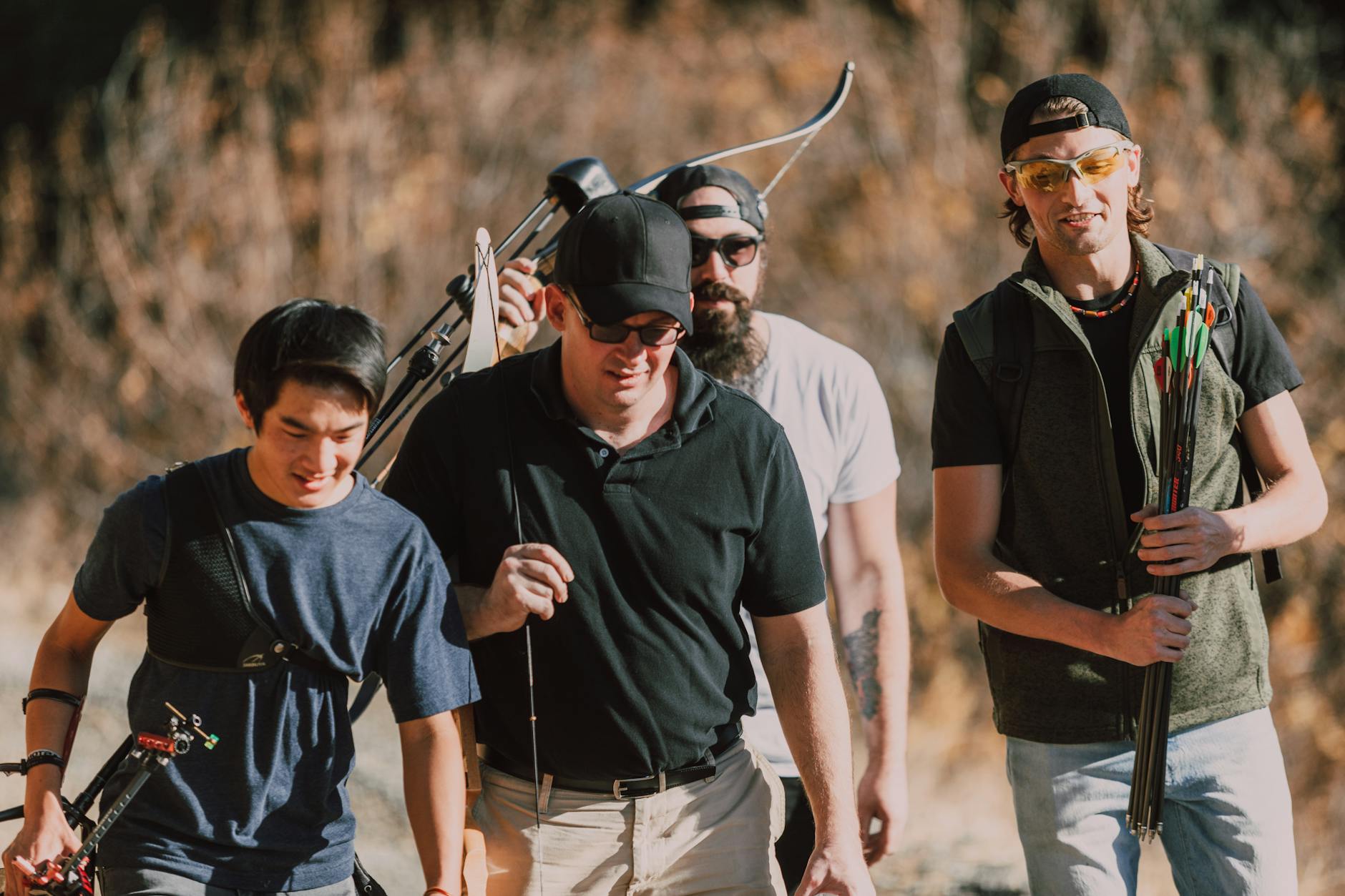 Complete backcountry hunting gear spread out systematically on a garage floor before packing