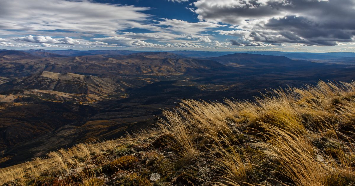 Glassing across a high alpine ridge on a windy autumn day in the western mountains